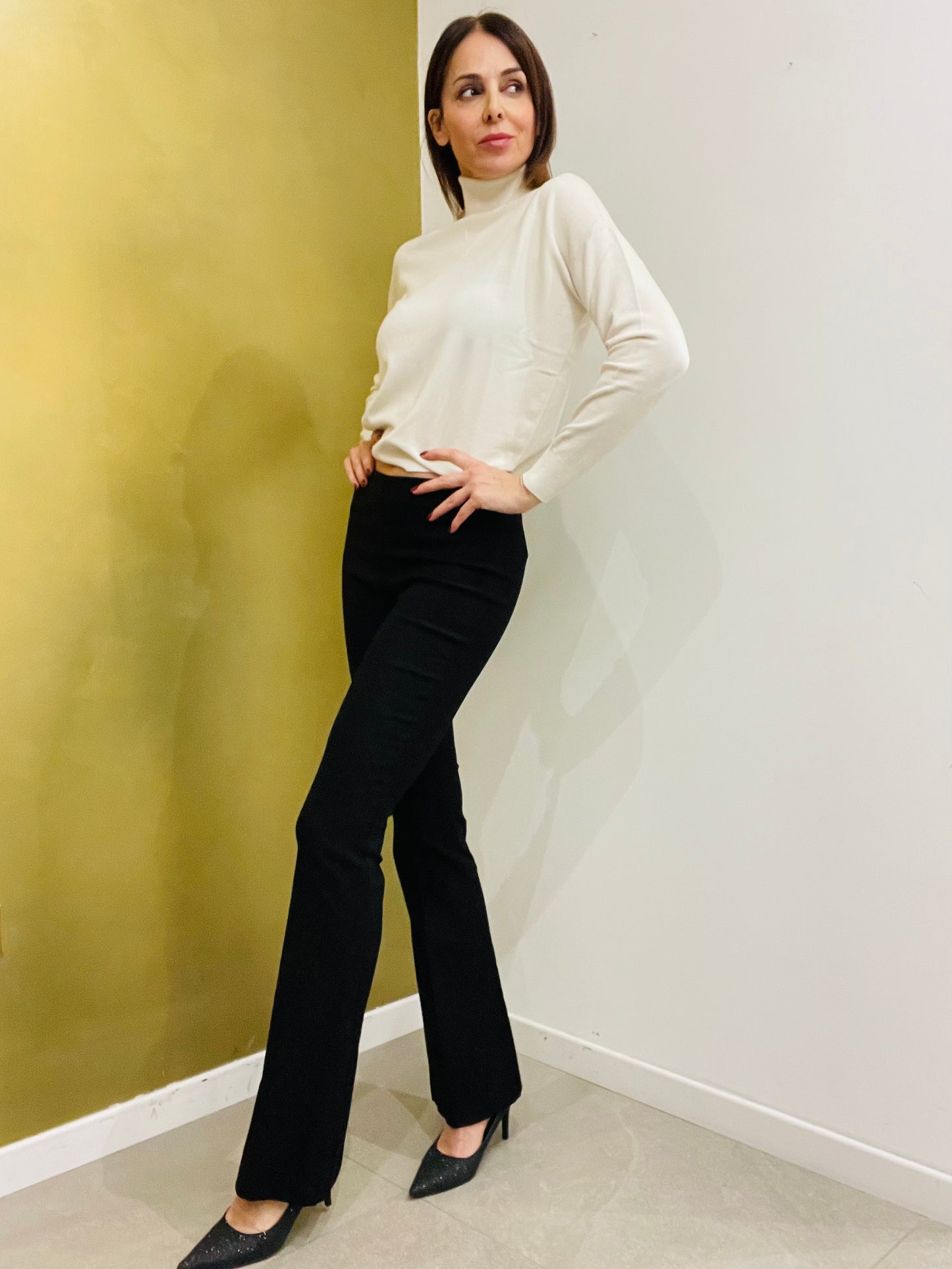 PANTALONE ADERENTE FLARE